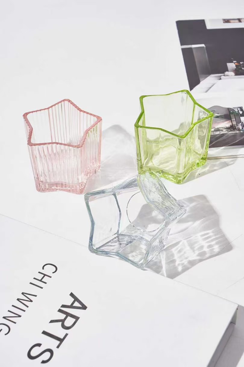 Csillag alakú üveggyertyatartó Csillag alakú üveggyertyatartó